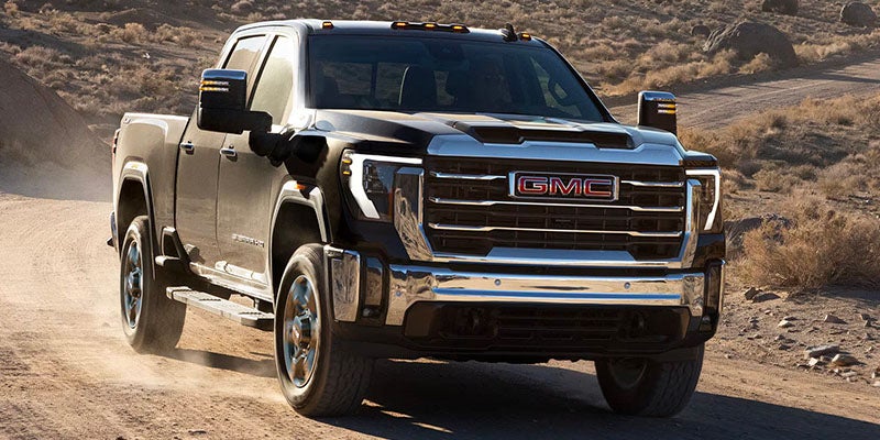 GMC Sierra 2500 HD traveling across a rocky desert