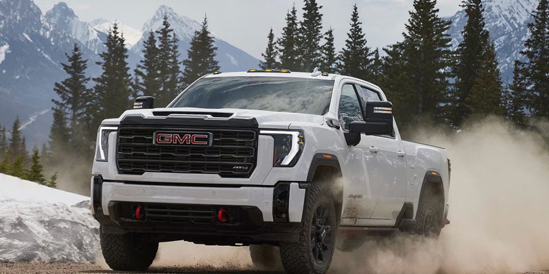 2026 GMC Sierra 2500 HD driving off-road